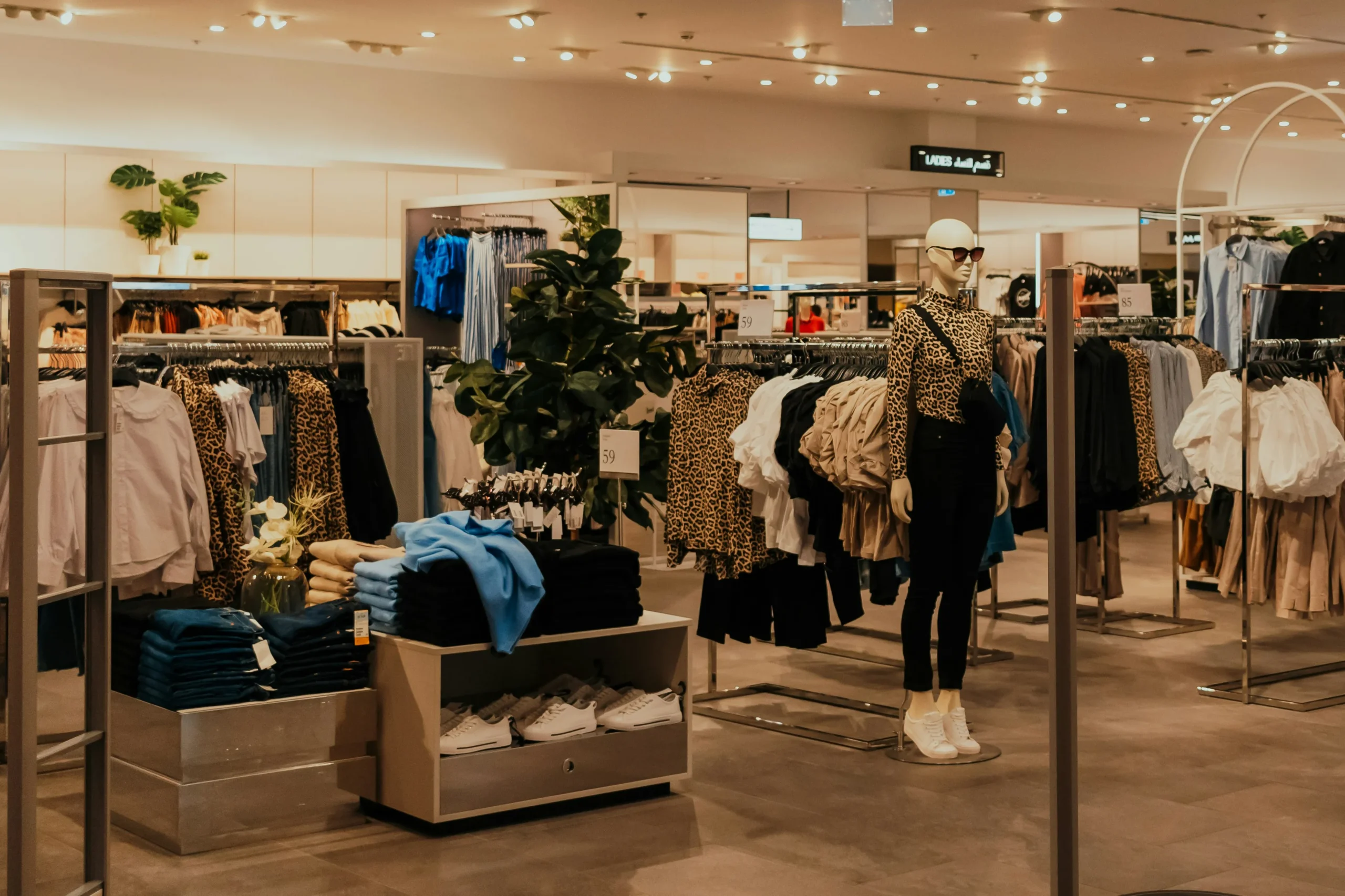 Apparel store interior with extended product range