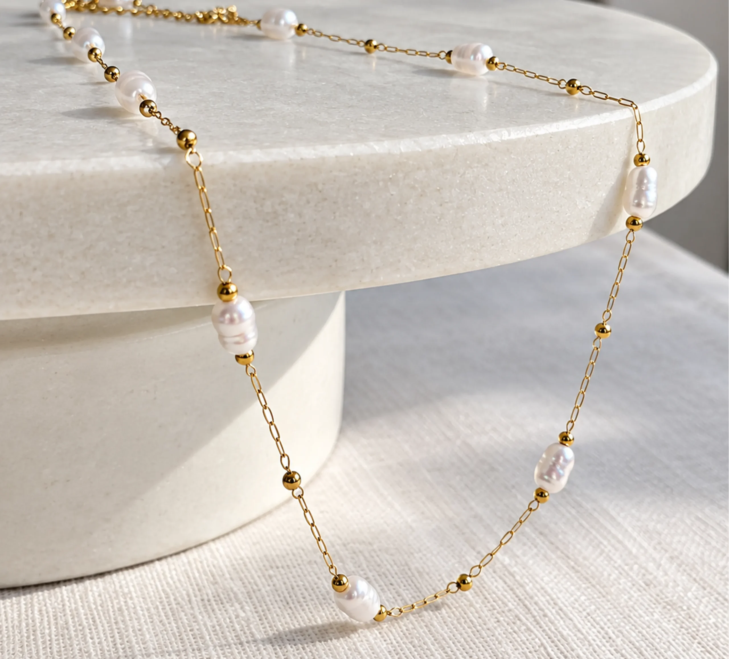 Gold and pearl necklace from LE | RU's jewellery range