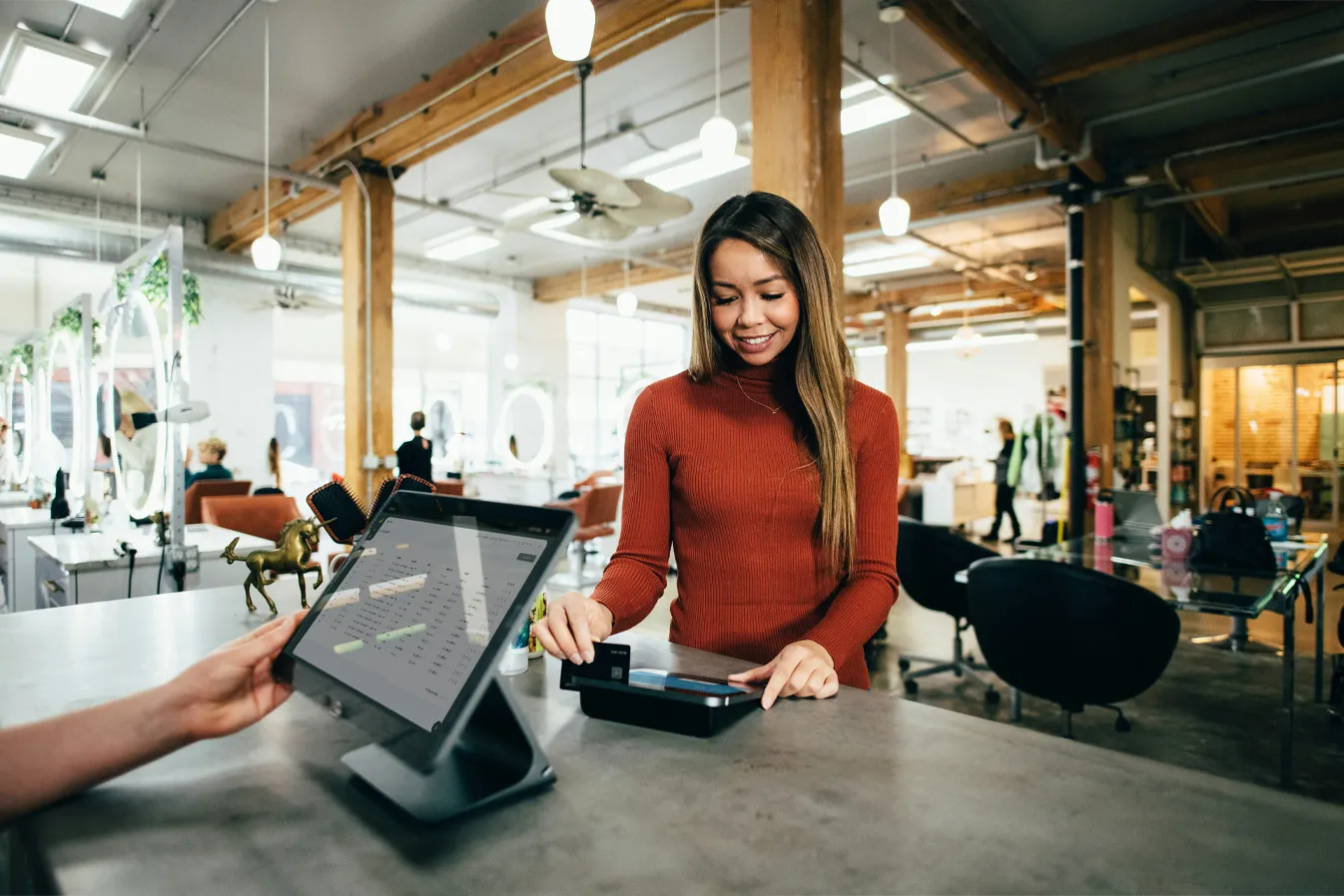 Staff member confidently using POS during a network outage